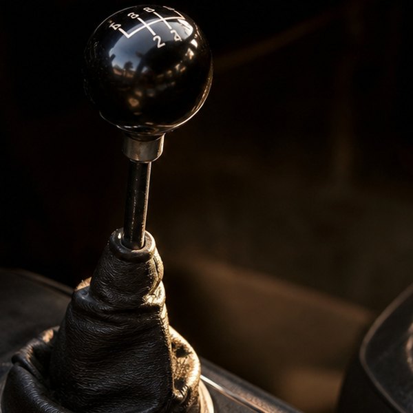 Manual gearstick lever in vehicle interior — detail